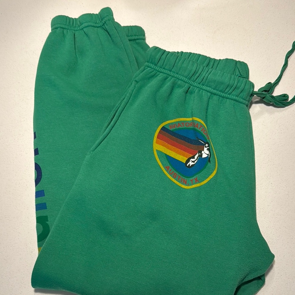 Aviator Nation Green Track Pants with Colorful Emblem
